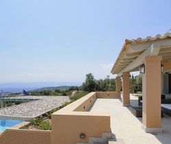 En venta Villa CON ENCANTO 7 HABITACIONES Agios Panteleimon distrito PORTOCHELI