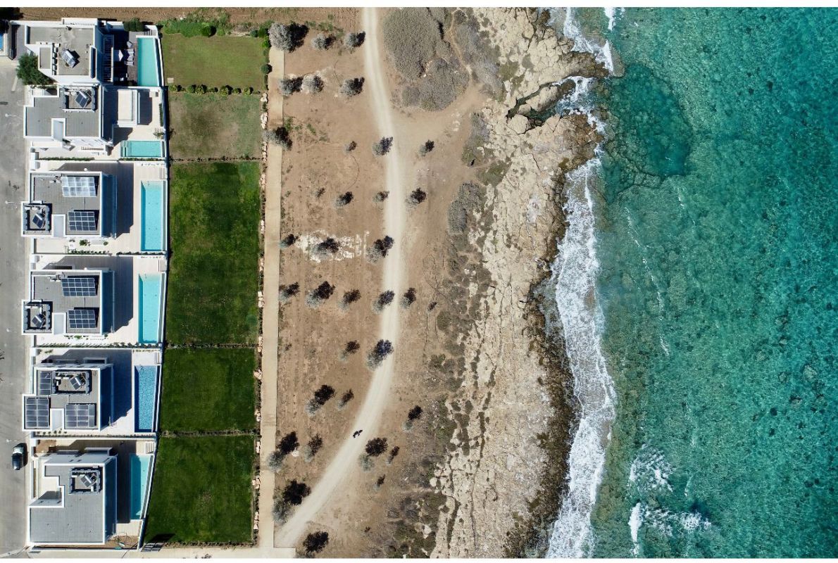 AERIAL VIEW OF THE BEACH FRONT VILLAS