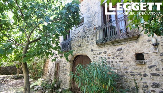 A vendre Charmante maison de caractÃ¨re, 4 chambres, avec jardin dans un joli village proche de Clermont l'Herault